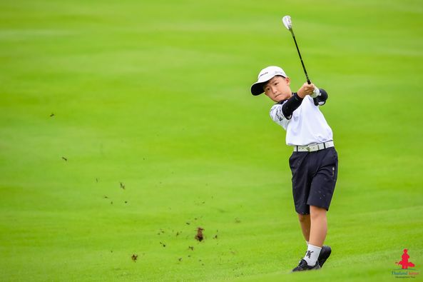 Alpinegolfresort Chiangmai 1 person golfing golf course and text-5