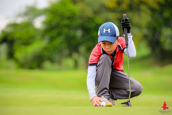 Alpinegolfresort Chiangmai 1 person golfing golf course and text