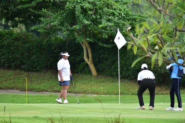 Alpinegolfresort Chiangmai 3 people people golfing and golf course