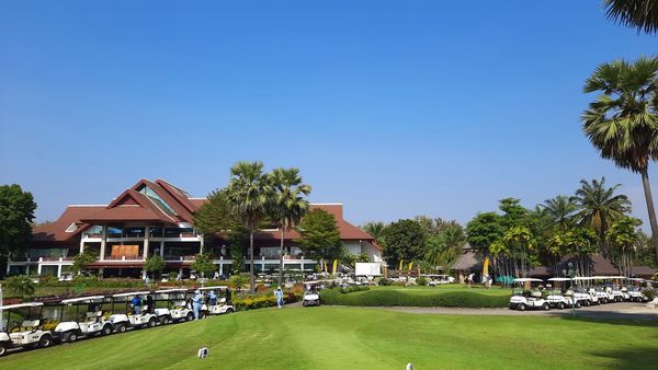 Summit Green Valley Chiangmai Country Club 2 people and grass