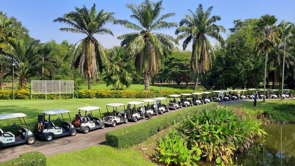 Summit Green Valley Chiangmai Country Club 2 people nature grass and tree