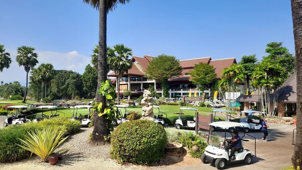 Summit Green Valley Chiangmai Country Club 2 people outdoors and tree