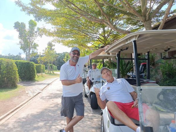 สนามกอล์ฟหริภุญชัย กอล์ฟคลับ 2 people and outdoors