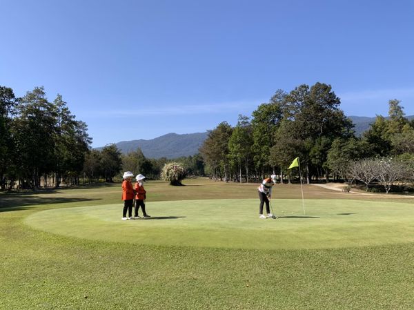Lanna Golf Club 3 people grass and golf course