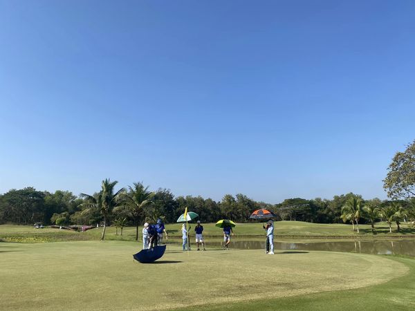 สนามกอล์ฟหริภุญชัย กอล์ฟคลับ 7 people people standing people playing sports and grass
