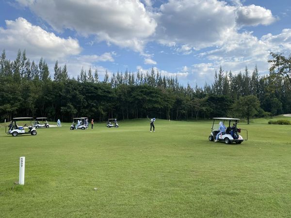 สนามกอล์ฟหริภุญชัย กอล์ฟคลับ 4 people people golfing golf cart and golf course