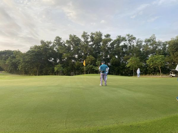สนามกอล์ฟหริภุญชัย กอล์ฟคลับ 2 people people golfing golf cart and golf course