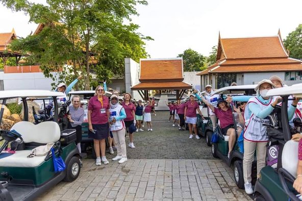 Banyan Golf Club Hua Hin 11 people people golfing golf cart golf course and text