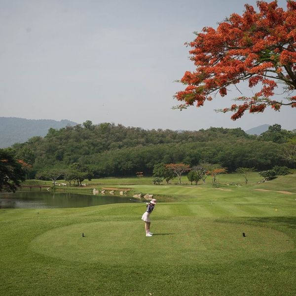 Khao Yai Country Club 1 person golfing and golf course