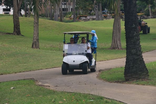 Lake View Resort amp Golf Club 3 people people golfing golf cart and golf course