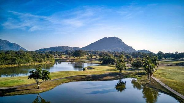 Lake View Resort amp Golf Club golf course lake mountain horizon and grass