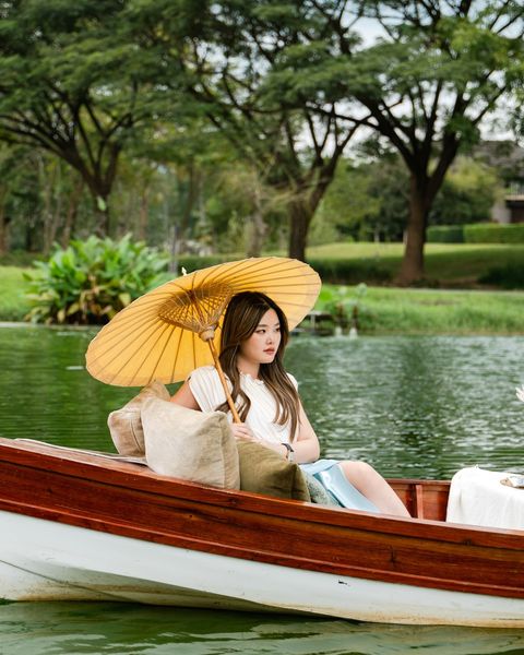 1 person sitting and body of water
