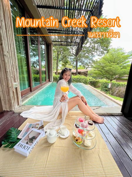 Mountain Creek Golf Resort And Residences 1 person and text Mountain Creek Golf Resort And Residences 1 person and text