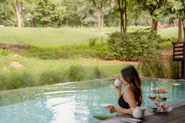 Mountain Creek Golf Resort And Residences 1 person and body of water