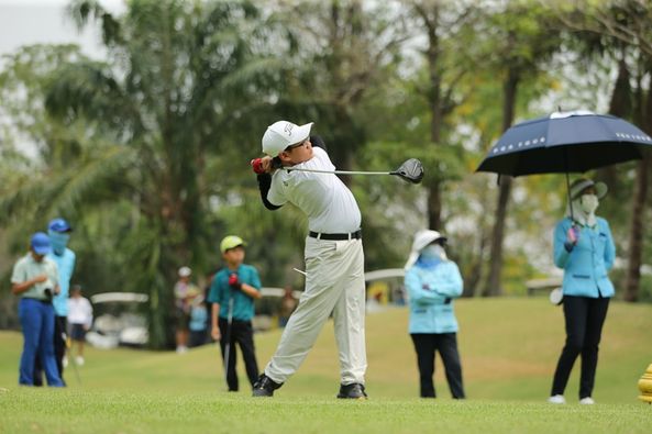 Khao Yai Country Club 7 people people golfing and golf course