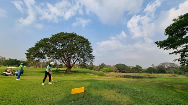 Mountain Creek Golf Resort And Residences 3 people people golfing grass golf course and tree