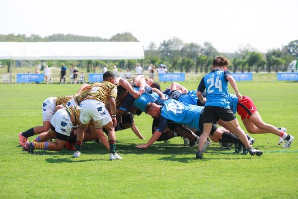 Pattana Sports Resort 7 people people playing American football people standing and grass Pattana Sports Resort 7 people people playing American football people standing and grass