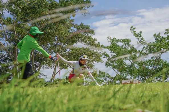 Wangjuntr Golf Park 2 people people standing outdoors and tree