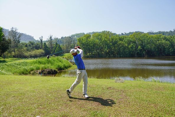 Wangjuntr Golf Park 1 person nature and grass