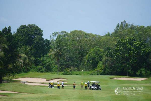 Eastern Star Country Club amp Resort 7 people grass tree and golf course