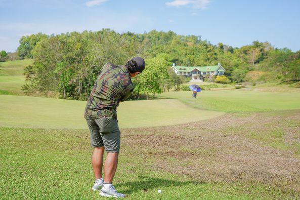 Wangjuntr Golf Park 2 people people playing sports grass and golf course