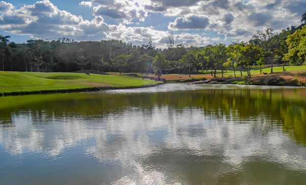 Wangjuntr Golf Park nature sky grass body of water and tree