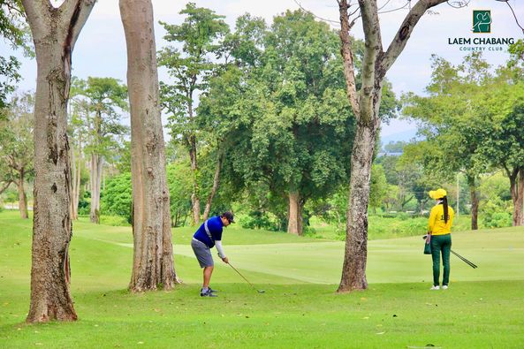 Laem Chabang International Country Club 2 people people playing sports golf course grass and nature