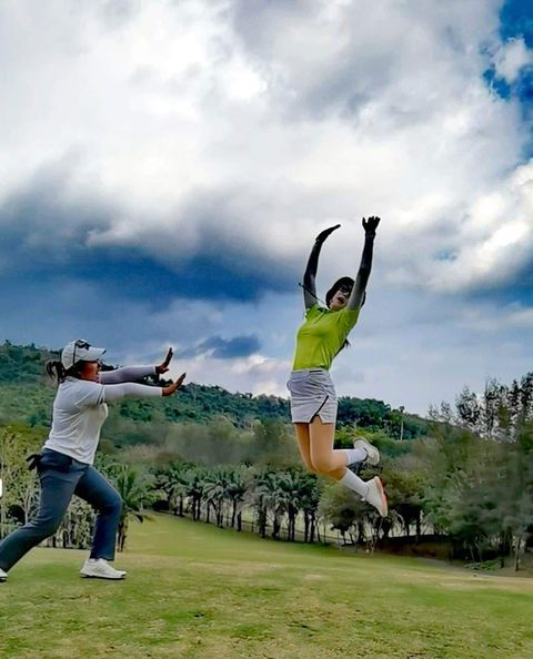 Wangjuntr Golf Park 2 people people playing sports people standing and outdoors