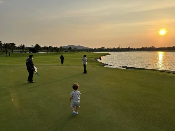 Amata Spring Country Club 5 people people golfing people standing grass and golf course