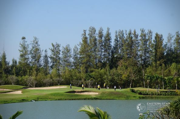 Eastern Star Country Club amp Resort 4 people body of water sky grass tree and nature