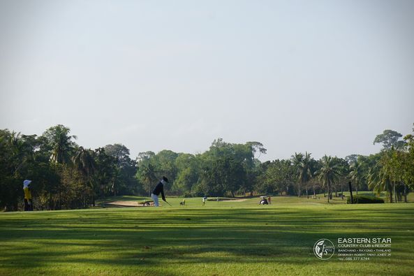 Eastern Star Country Club amp Resort 5 people golf course grass tree and nature