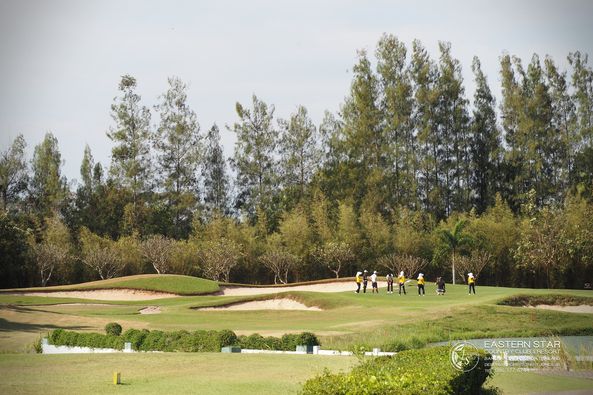 Eastern Star Country Club amp Resort 8 people people standing and grass