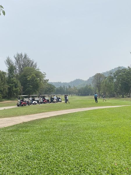 Bangpra Golf Club and Resort 4 people people golfing golf cart grass and golf course