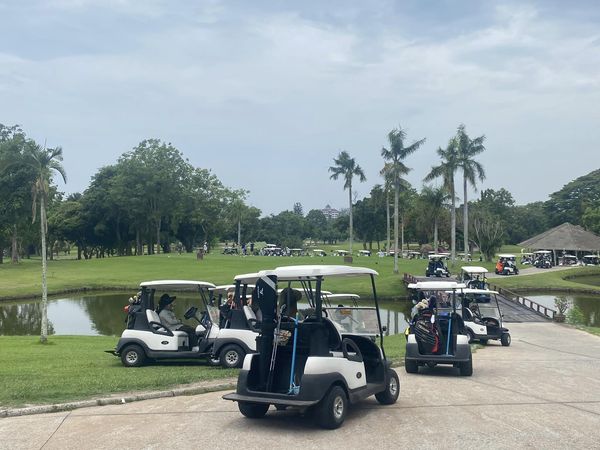 Bangpra Golf Club and Resort 3 people people golfing golf cart and golf course