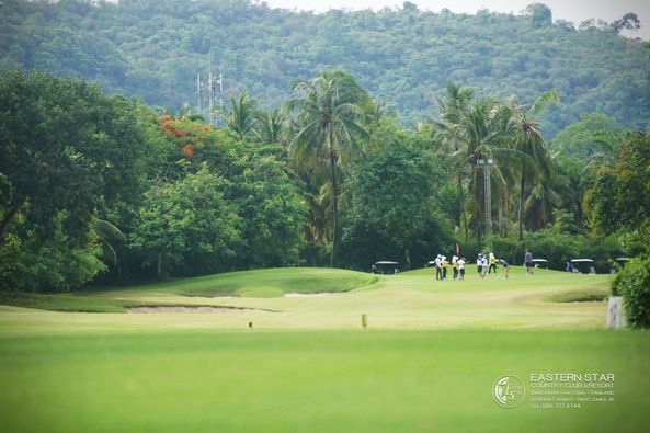 Eastern Star Country Club amp Resort 4 people people golfing golf cart golf course and text