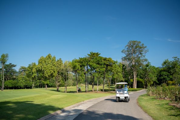 Chatrium Golf Resort Soi Dao Chanthaburi nbsp 1 person golfing golf cart and golf course