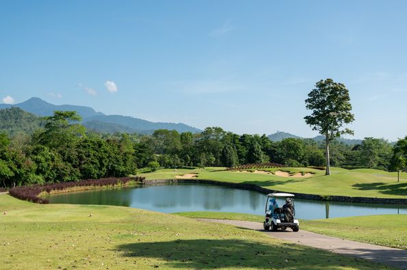 Chatrium Golf Resort Soi Dao Chanthaburi nbsp 2 people people golfing golf cart and golf course