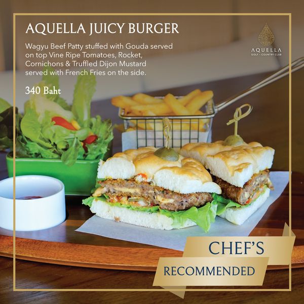 Aquella Golf amp Country Club food and AQUELLA JUICY BURGER Wagyu Beef Patty stuffed with Gouda served on top Vine Ripe Tomatoes Rocket Cornichons Truffled Dijon Mustard served with French Fries on the side 340 aht AQUELLA GOLF COUNTRYCLU DUNTE CHEF S RECOMMENDED Aquella Golf amp Country Club food and AQUELLA JUICY BURGER Wagyu Beef Patty stuffed with Gouda served on top Vine Ripe Tomatoes Rocket Cornichons Truffled Dijon Mustard served with French Fries on the side 340 aht AQUELLA GOLF COUNTRYCLU DUNTE CHEF S RECOMMENDED
