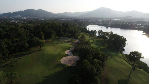 Red Mountain Golf Club Phuket Thailand nature sky lake tree grass and golf course