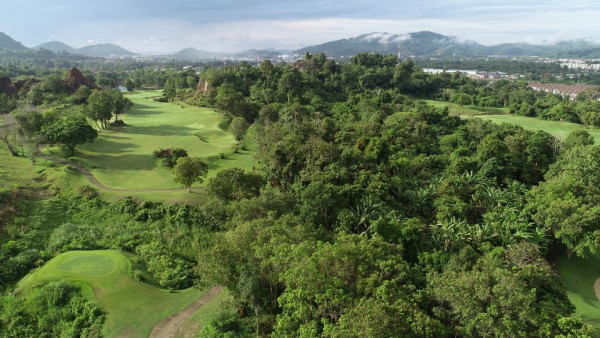 Red Mountain Golf Club Phuket Thailand tree nature grass and golf course