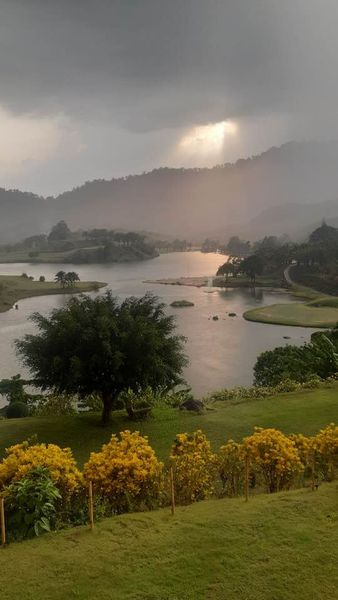 Katathong Golf Resort amp Spa grass horizon cloud and lake