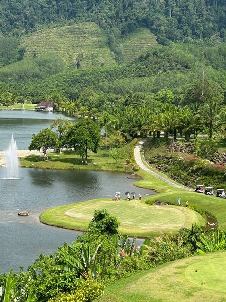 Katathong Golf Resort amp Spa 4 people grass golf course lake and mountain