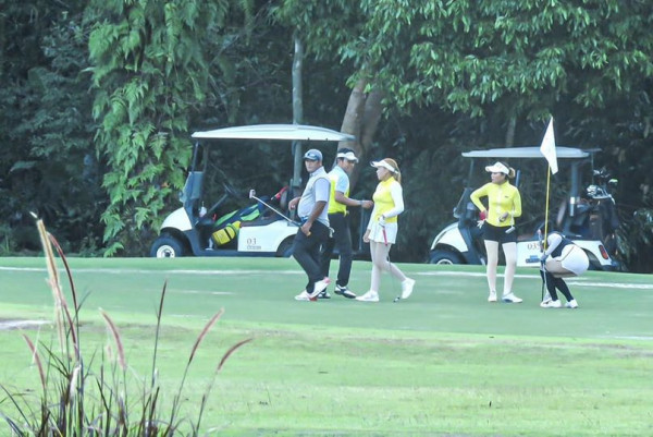 Katathong Golf Resort amp Spa 5 people people golfing golf cart golf course and text