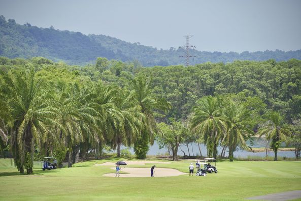 Blue Canyon Country Club 4 people people golfing golf cart golf course and grass