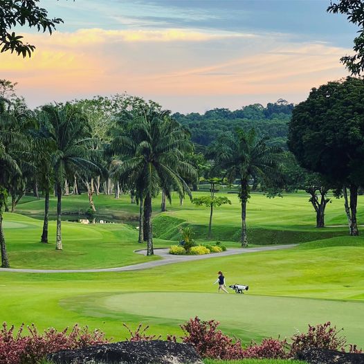 Blue Canyon Country Club 2 people people golfing golf cart golf course and twilight