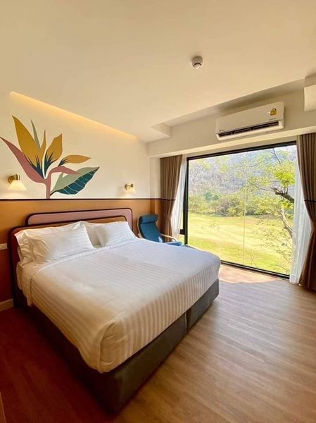 Bangpakong Riverside Country Club bed indoors and bedroom